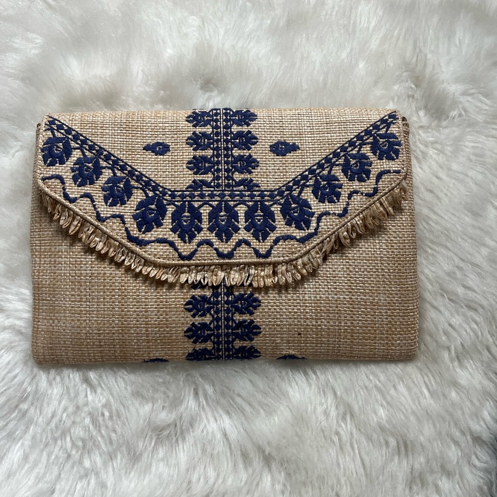 Stella and Dot raffia 
Embroidered Tan and Blue Clutch
Super cute for summer